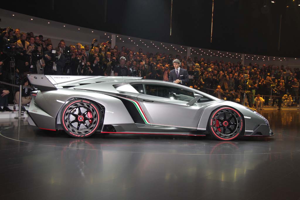 Photo:  Lamborghini CEO Stephan Winkelmann checks out the new Veneno during its Geneva debut.